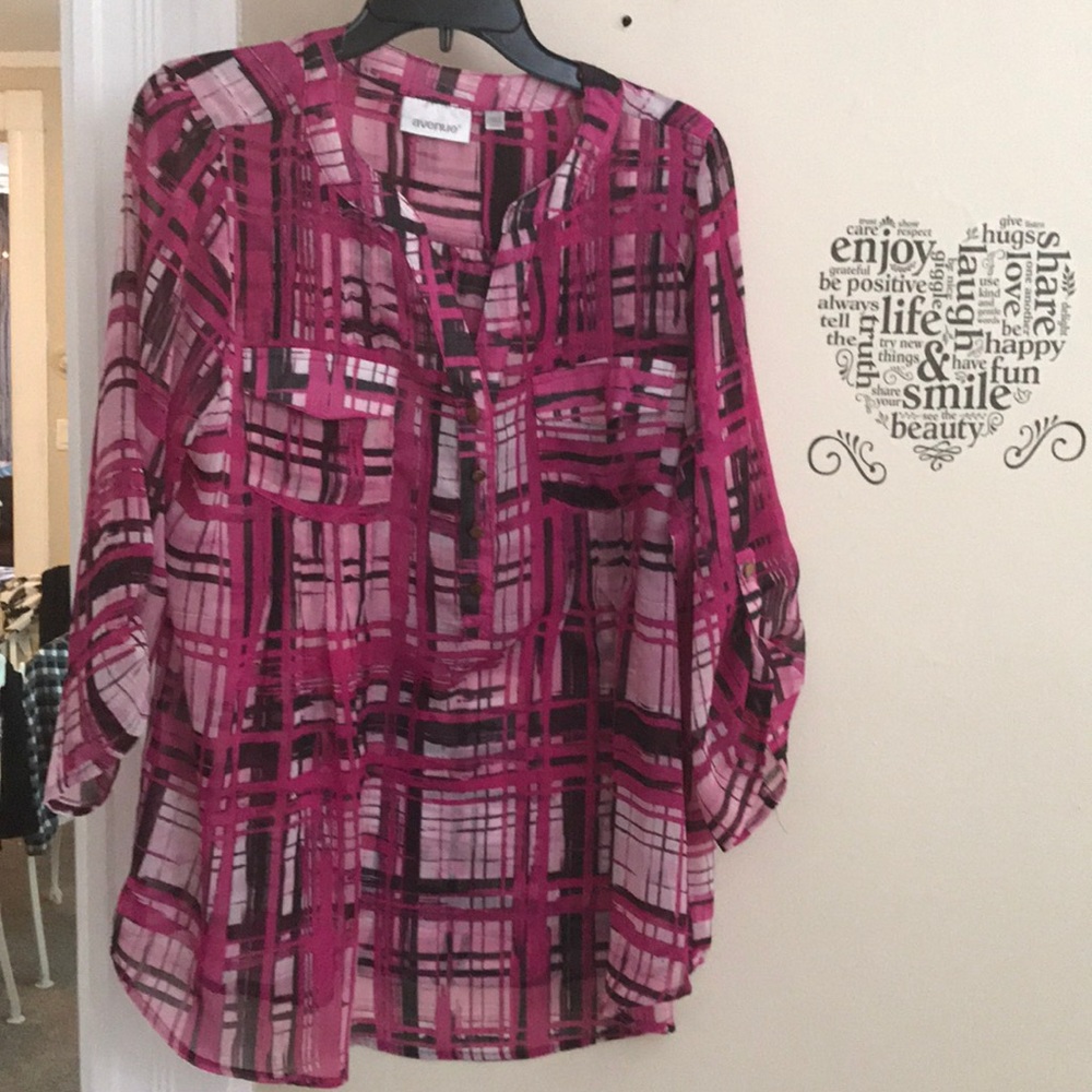 A 14/16 pink, black and white shirt from Avenue